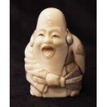 Japanese carved ivory netsuke figure