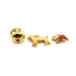 Three 18ct yellow gold charms