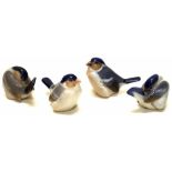 Four Royal Copenhagen ceramic bird figurines