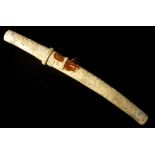 Japanese tanto katana in carved bone sheath