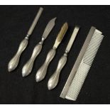 Five sterling silver manicure implements