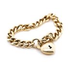 A heavy 9ct yellow gold bracelet and heart padlock