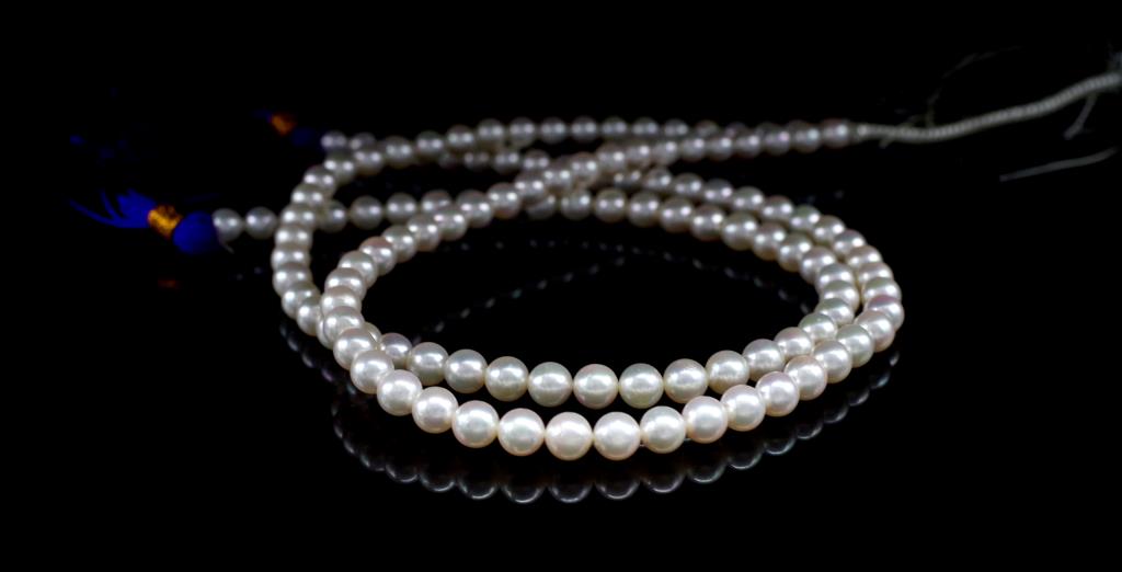 Two strands of cultured pearls
