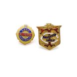 Two 9ct yellow gold and enamel lapel badges