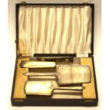 Sterling silver four piece dressing table set