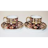 Two Royal Crown Derby "Imari"coffee cans & saucers