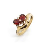 Garnet, diamond and 9ct yellow gold ring