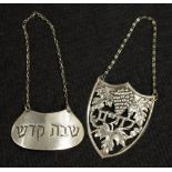 Two Judaic sterling silver decanter labels