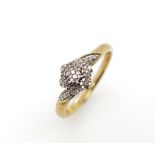 Diamond and 9ct yellow gold daisy ring