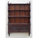 Ornately carved 19th century wall shelf