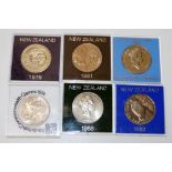 Six New Zealand commemorative $1 silver coins