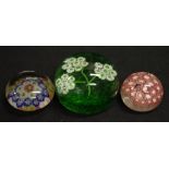 Three Millefiori glass paper weights