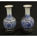 Pair vintage Chinese blue & white vases