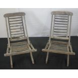 Two vintage teak folding deck chairs