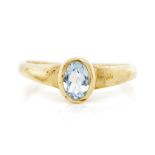 Blue topaz and 9ct yellow gold ring