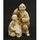 Japanese carved ivory netsuke figure