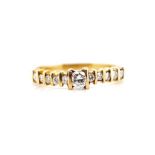 Eleven stone diamond and yellow gold ring