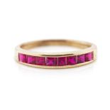 Red topaz set 9ct yellow gold ring