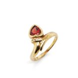 Garnet and diamond set 9ct yellow gold ring