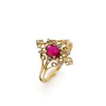 Red gemstone and 9ct yellow gold ring