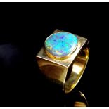 Black opal and 18ct yellow gold ring