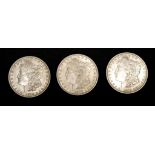 Three American Morgan one dollar coins