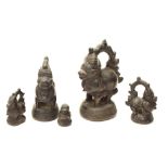 Graduated set of five cow bronze opium weights