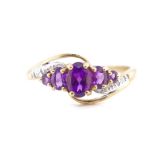 Five stone amethyst and 9ct yellow gold ring