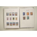 Three Olympic Games stamp albums