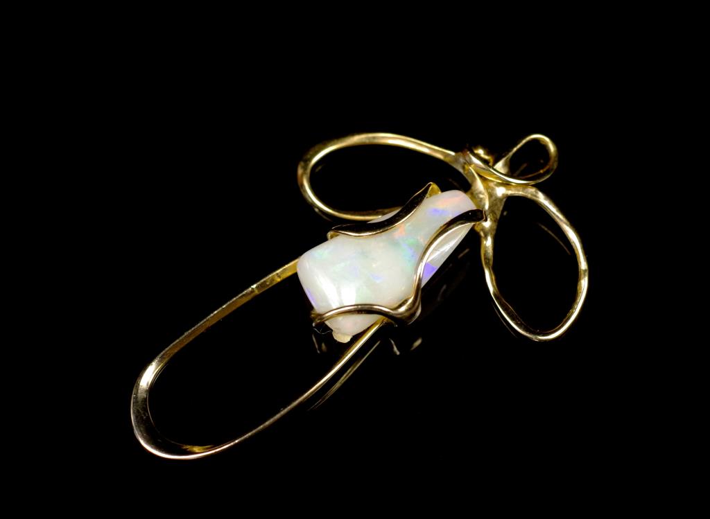 White opal and 9ct yellow gold pendant