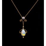 Opal set Edwardian 9ct yellow gold pendant