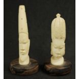Two African carved ivory figures