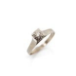 Diamond solitaire and white gold ring
