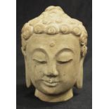 Early carved stone Head of Buddha