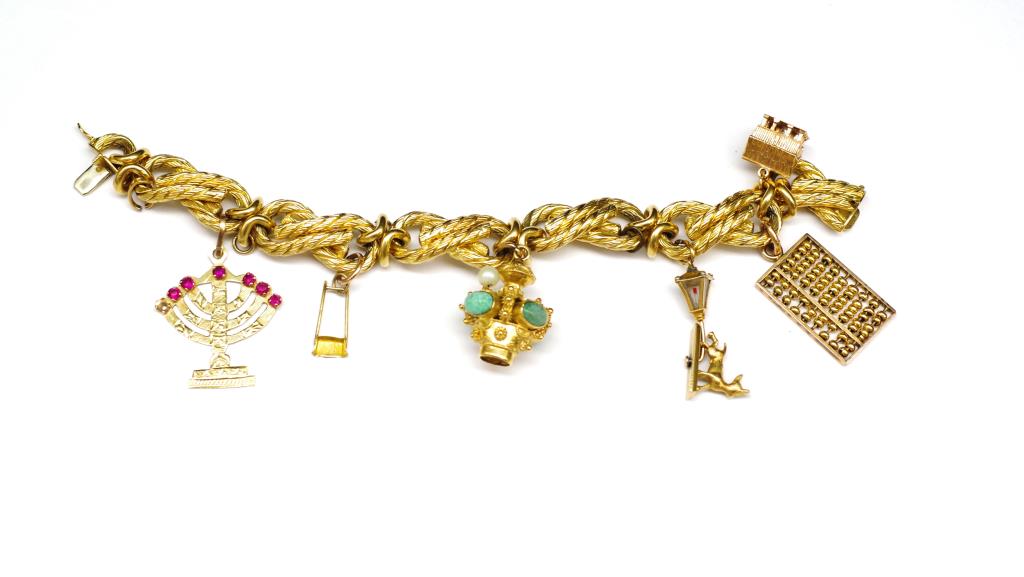 A heavy yellow gold charm bracelet