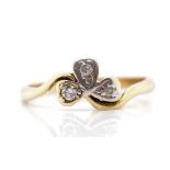 Diamond and yellow gold clover ring