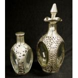 Two Chinese sterling silver pierced decanters
