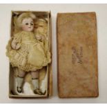 Antique miniature porcelain doll