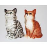 Two Beswick seated cats looking up figurines