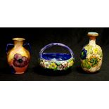 Three various blossom decorated ceramic vases