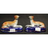 Two antique Staffordshire greyhound dog figures