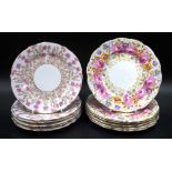 Two sets of six cake plates