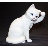Beswick seated white cat scratching ear figurine