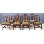 Eight Geo III & later Hepplewhite mahogany chairs