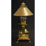 Brass based antique style table lamp