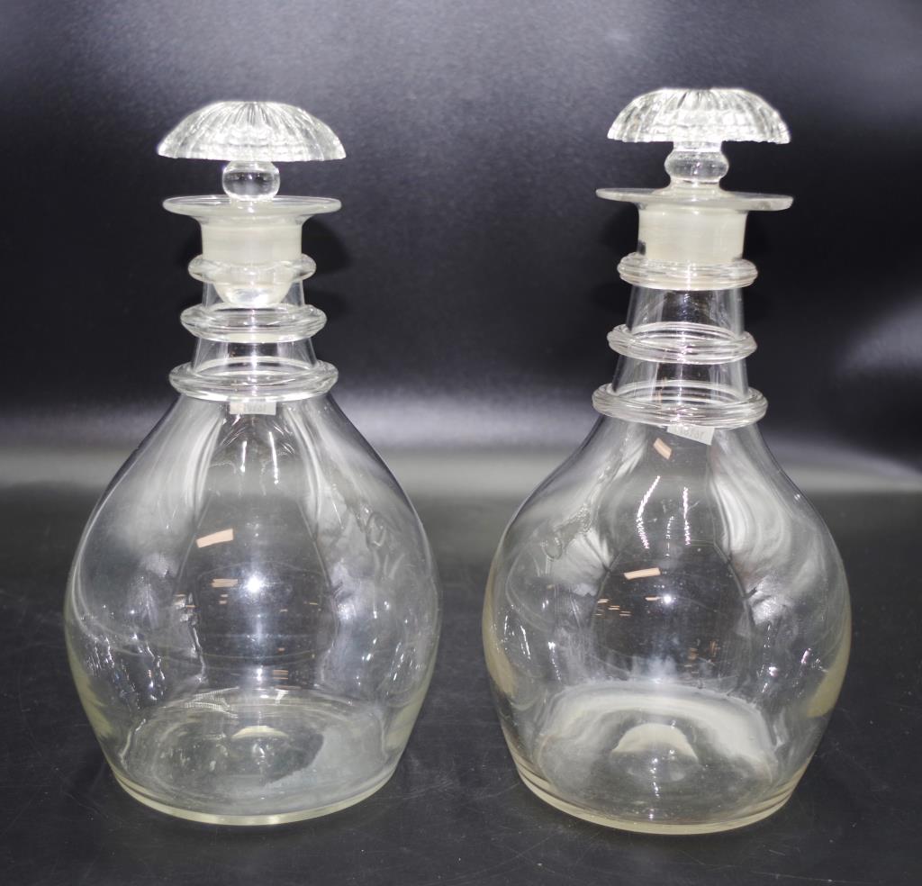 Two Georgian three ringed neck glass decanters