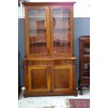 Victorian serpentine front elevated bookcase