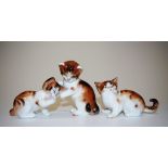 Three Royal Doulton tan & white cat figures