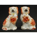 Pair Victorian Staffordshire small dog figures