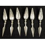 Six silver corn cob holders